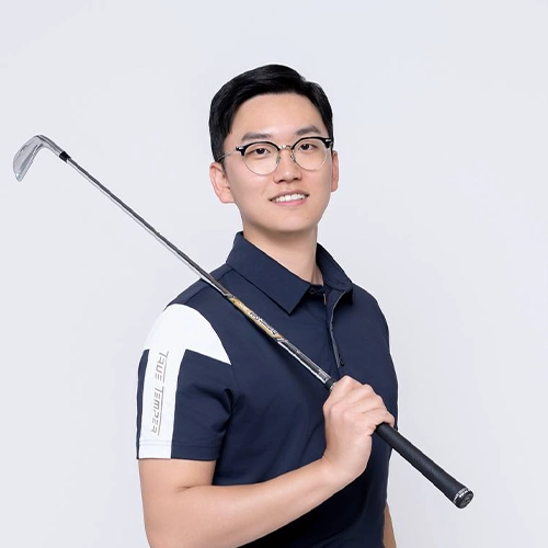 Professional golfer Minho Hong posing with a golf club.